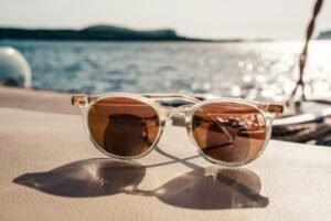 white framed brown lens sunglasses