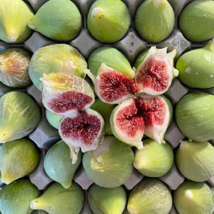 green and red fruit in close up photography